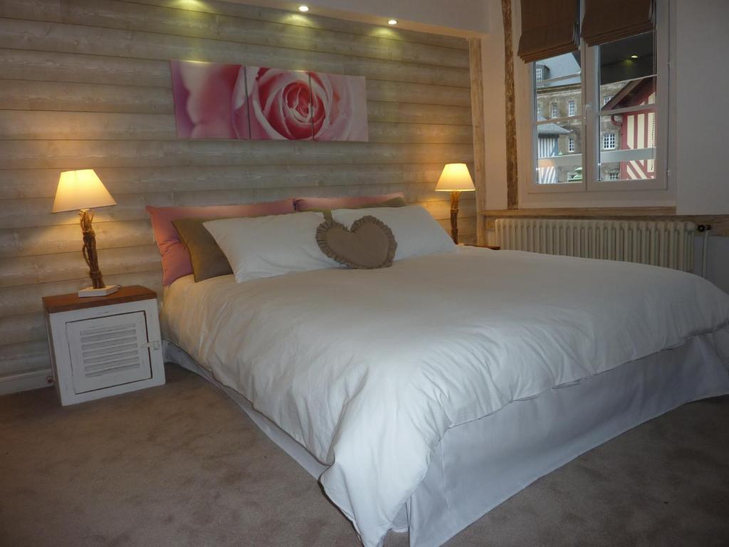 Hotel Le P'Tit Beaumont Pokoj fotografie
