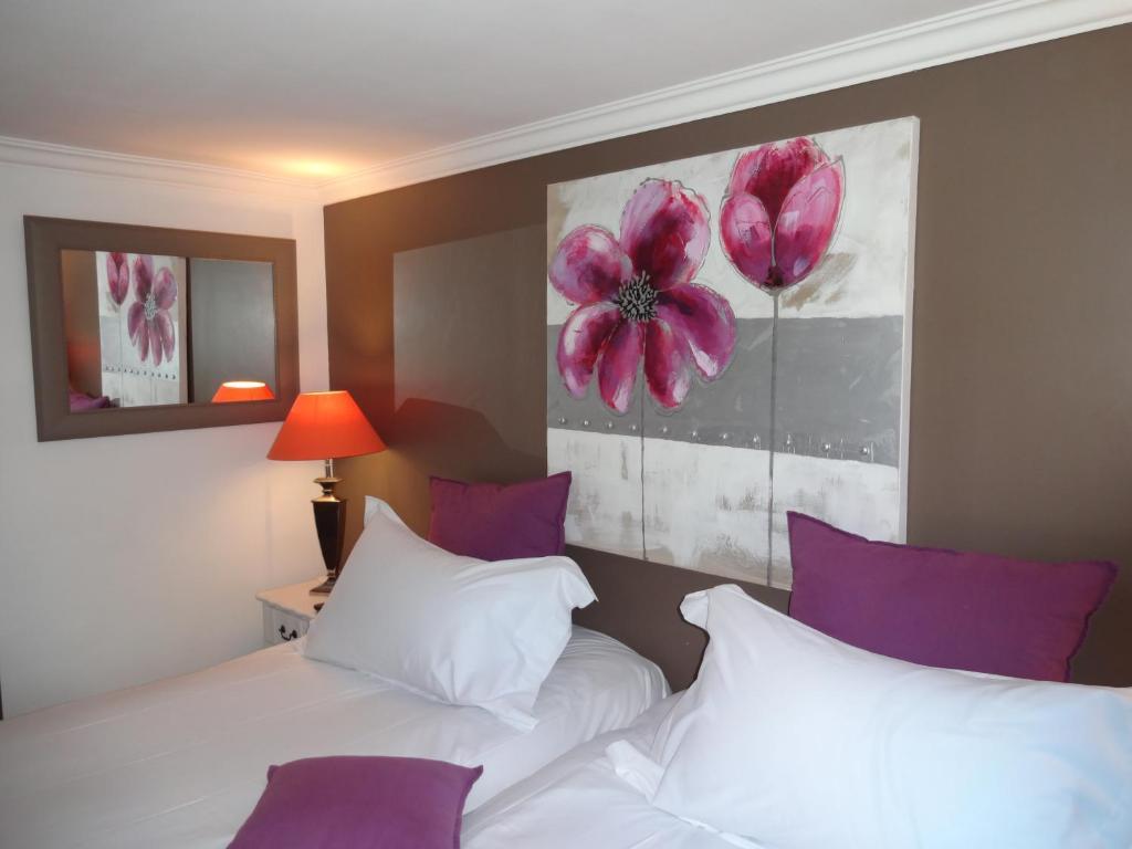 Hotel Le P'Tit Beaumont Pokoj fotografie